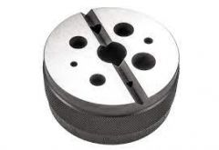 Bench Block, 3" (75mm) in diameter by 1-1/2" (38mm) high with oversize holes from 1/8 to 5/8" (3-16mm) diameter and one v-groove. STARRETT (129)